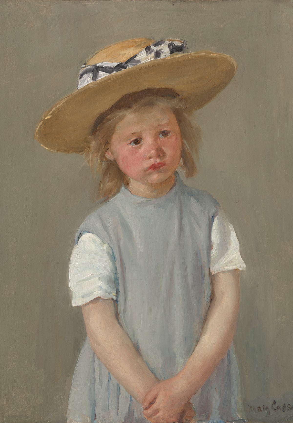 Bambino con cappello di paglia