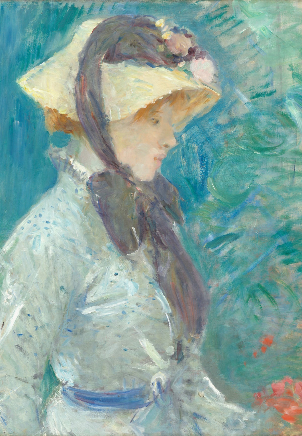 Junge Frau mit Strohhut