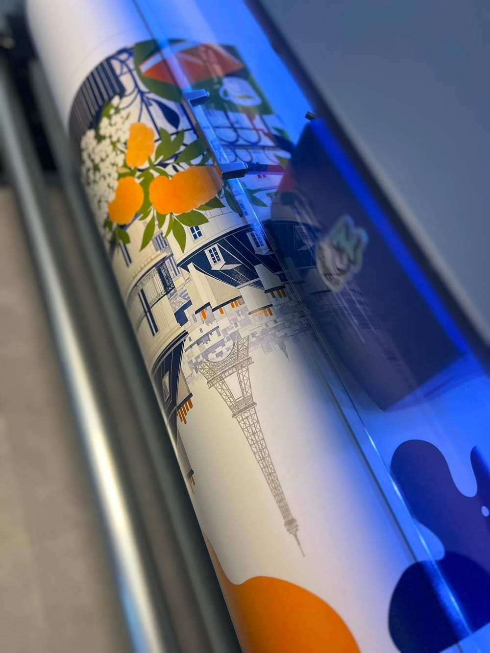 Poster being printed on the workshop's large-format printer